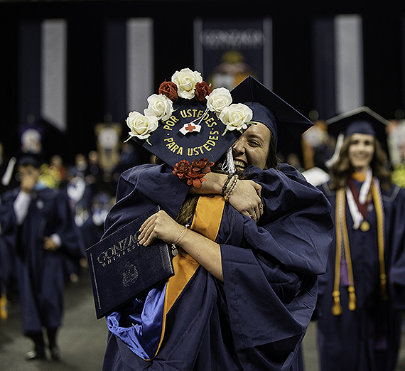 Women poses in nursing jacket.