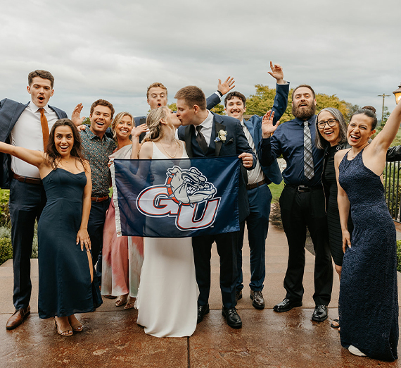 Katie and Ryan Harnetiaux stand in the Gonzaga Hall of Honor